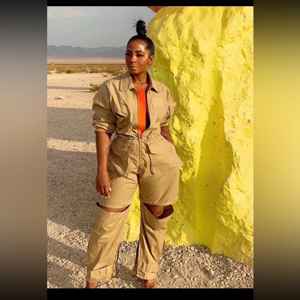 Khaki jumpsuit by The Vault by Sacha. Zipper details